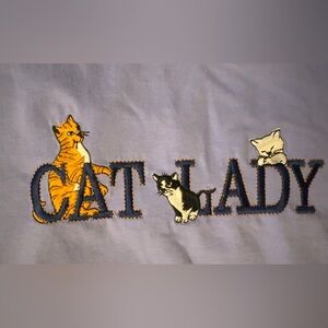 Beautiful embroidered cat lady purple tee
